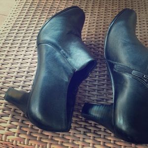 Trotters black booties with heel and side zip.